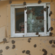 A US Army soldier observes the protests from a watchtower inside the embassy compound.